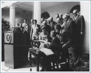 President Lyndon B. Johnson signing the Wilderness Act, September 3, 1964.